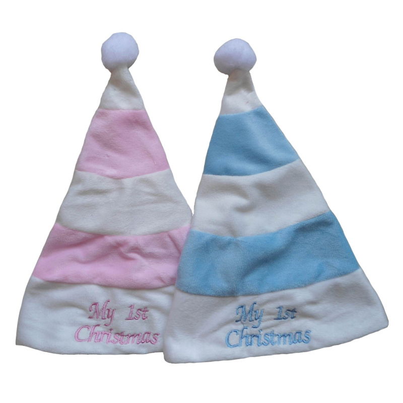 Le premier ensemble de bas de chapeau de Noël de bébé