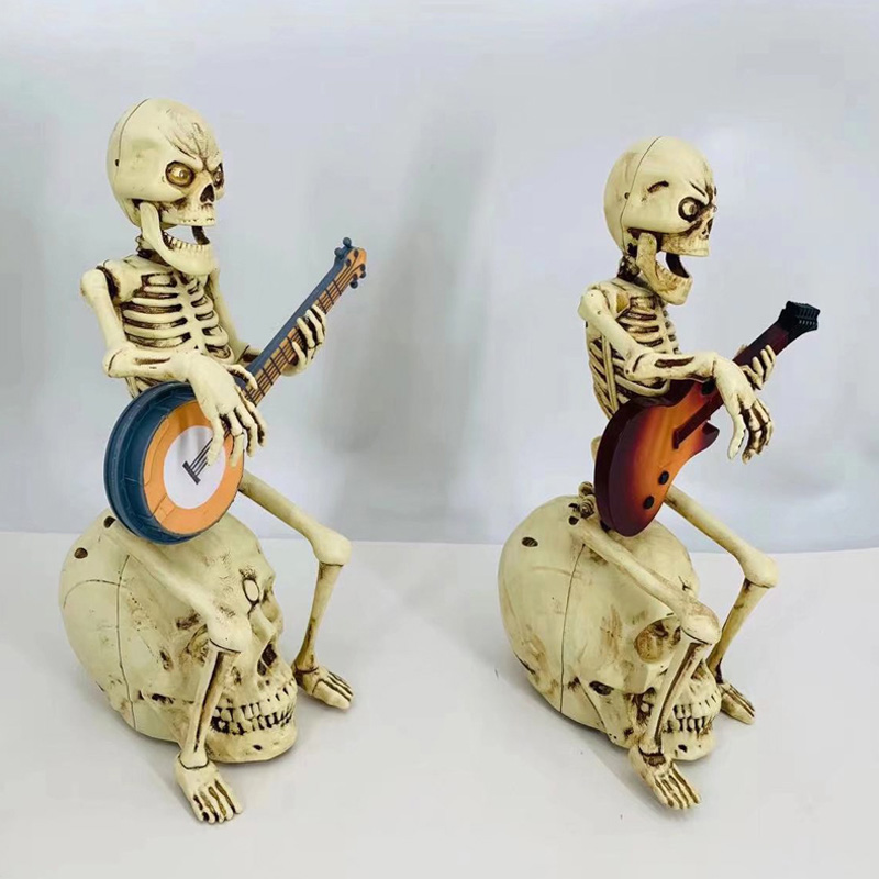 Figurine Rock & Roll Sit Skeleton jouant de la guitare électrique